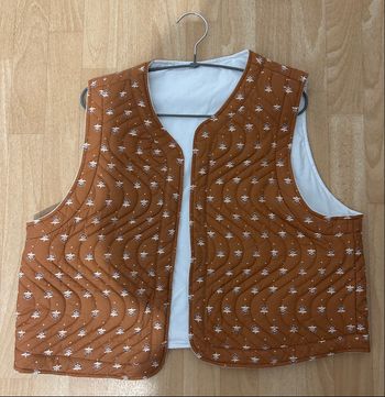 Veste réversible sans manche