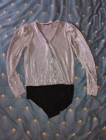 Jolie body argenté taille XS en excellent état