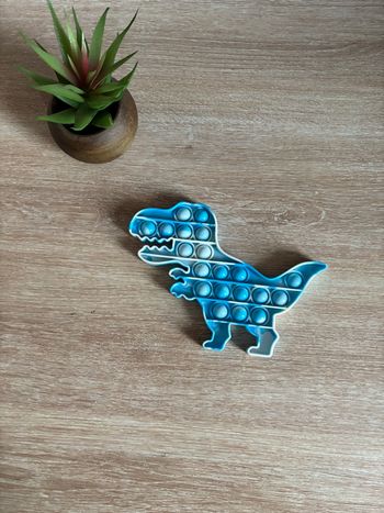 Pop bleu forme dinosaure 