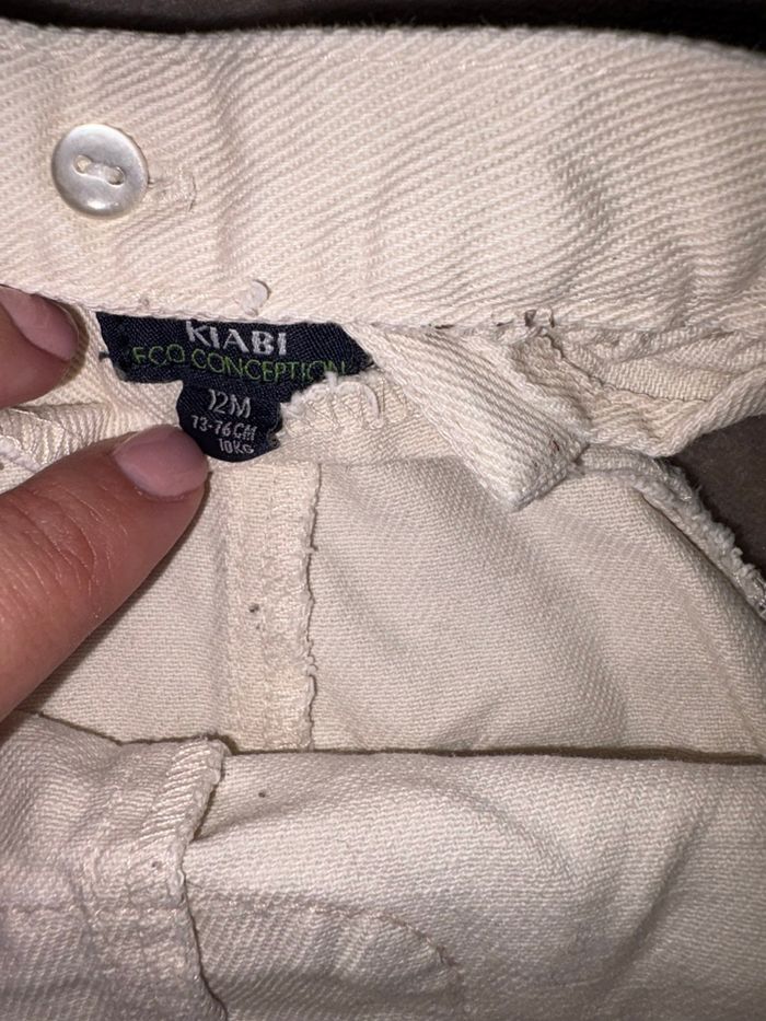 Lot de deux salopettes en jean beige pour jumelles Kiabi taille 12 mois en très bon état - photo numéro 4