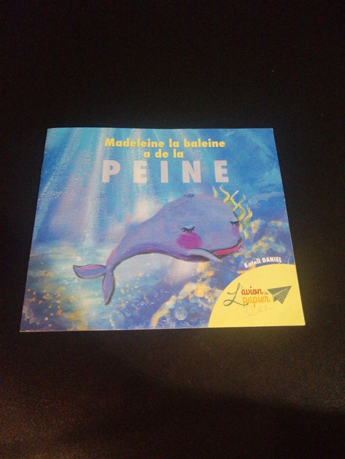 Livre souple madeleine à de la peine