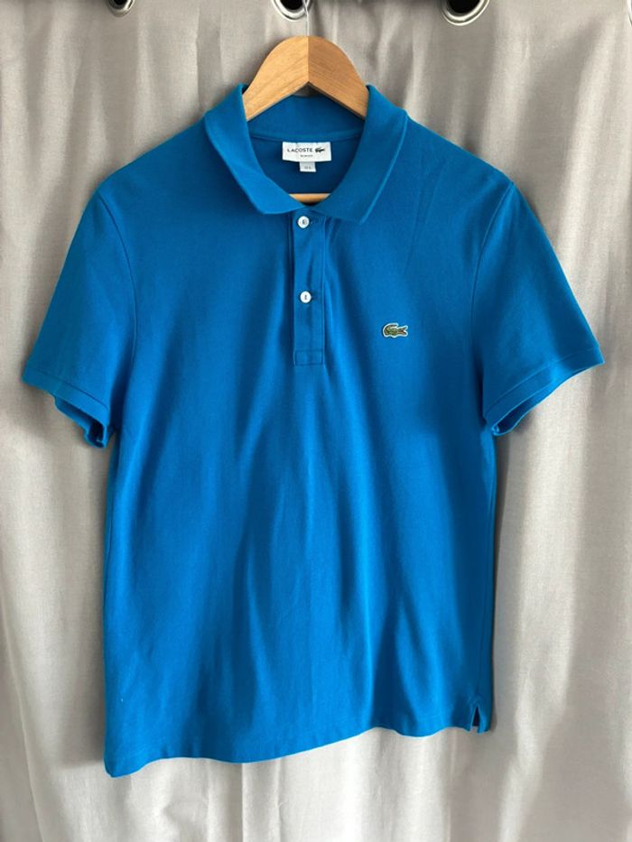 Polo Lacoste bleu électrique taille m très bon état - photo numéro 2