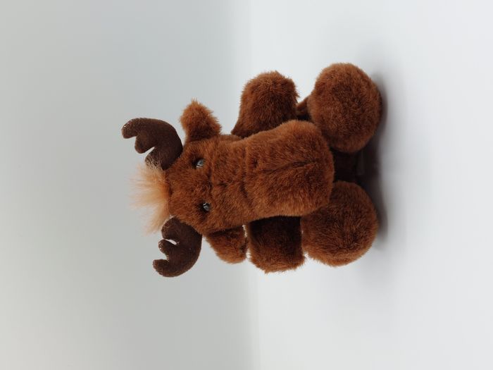 Peluche doudou élan orignal renne moose marron beige nœud rouge 17 cm Canada
