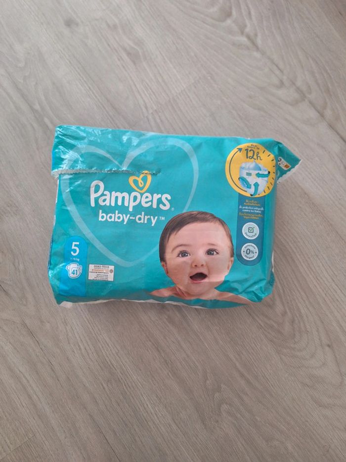 Couches Pampers baby dry taille 5 - entamé