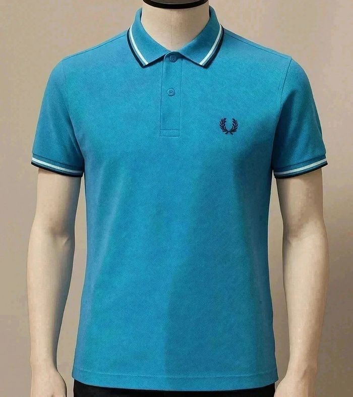 🌟 Polo Fred Perry bleu ciel - Taille XS