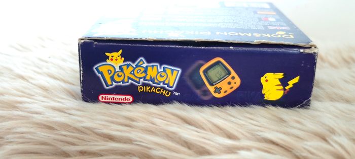 Console Tamagotchi Pikachu pokémon Nintendo podomètre - photo numéro 7