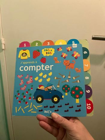 Livre carton 1er âge « J apprends à compter » ballon