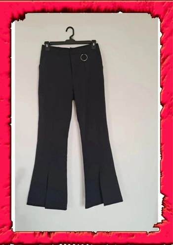 Elegant pantalon patte d'éléphant et fendu sur le bas