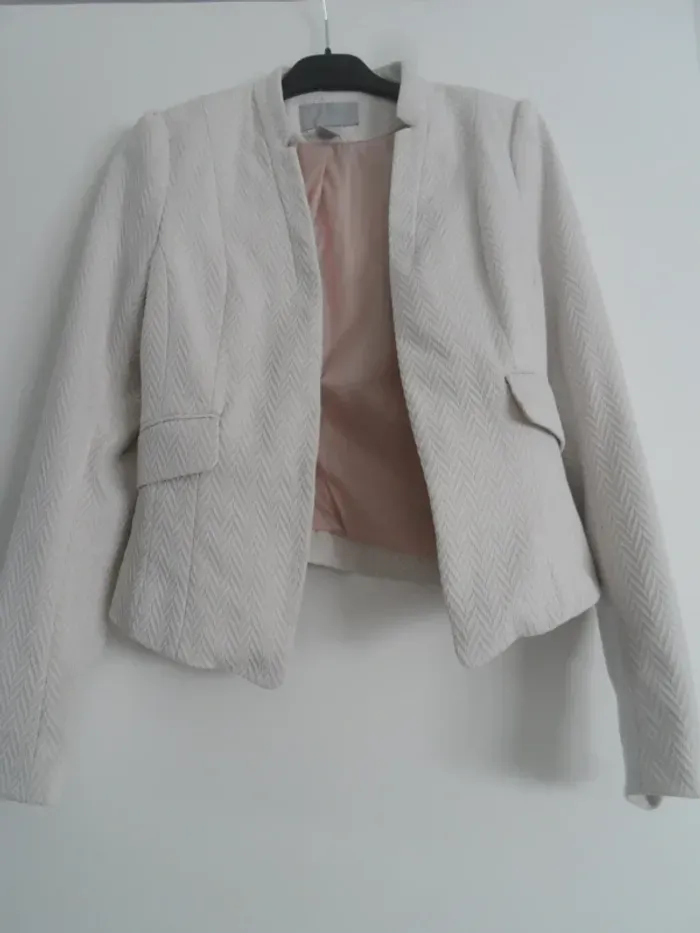 veste H ET M bien LIRE