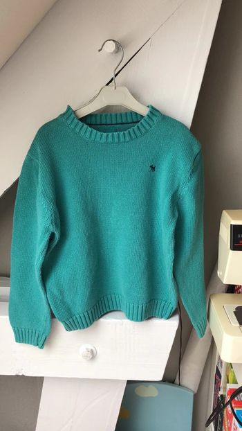 Pull vert CFK taille 8 ans