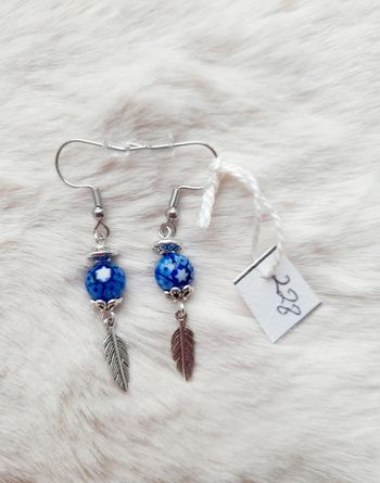 Boucles d'oreilles plume bleu