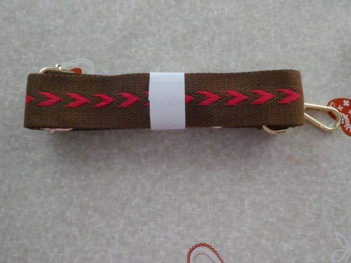 Bandoulière de sac brun rougeâtre