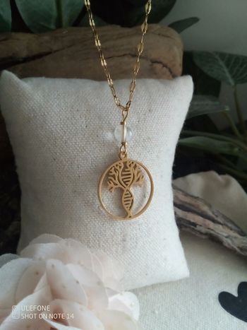 Collier cristal de roche et médaillon adn arbre de vie