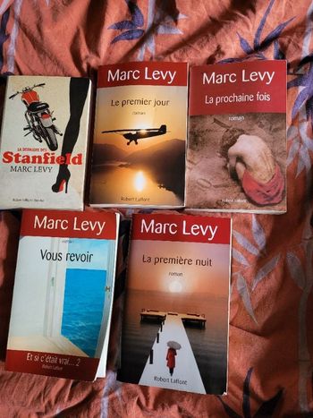 Romans Marc Levy (2 photos)