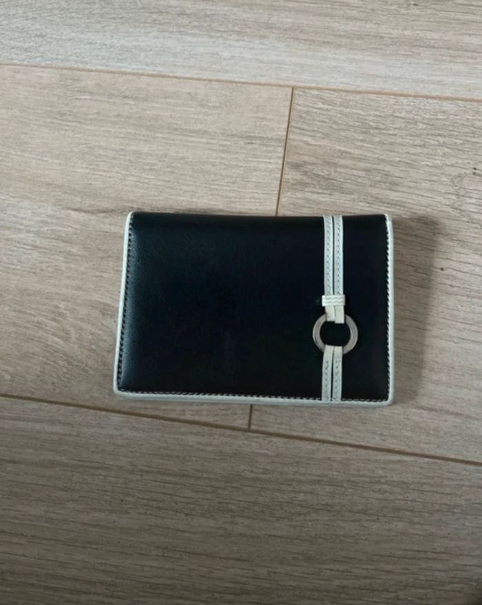 Portefeuille noir et crème