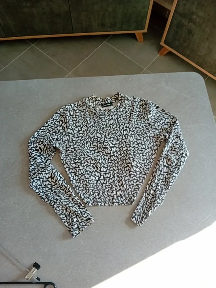 Top manche longue ouvert dans le dos en taille L de Tally Weiljl