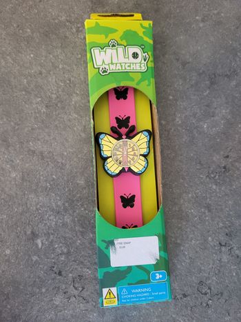 Montre SNAP papillon + pile neuve