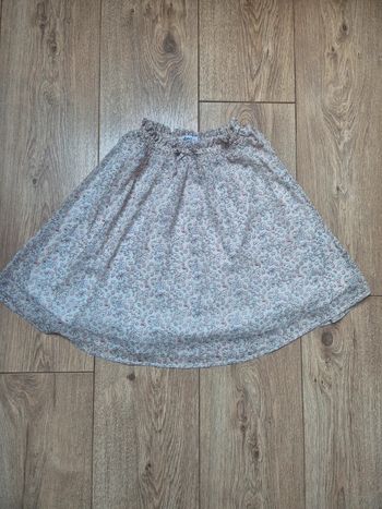 Jupe gémo beige à motif 12 ans état neuve