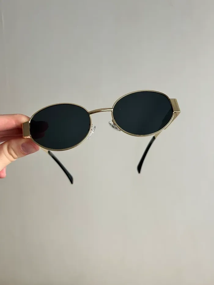 Lunette de soleil dorée en excellent état - photo numéro 4
