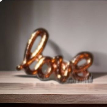 Boucle oreille LOVE doré rosé