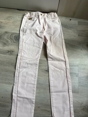 Jean fille  rose gold avec motif 10 ans neuf