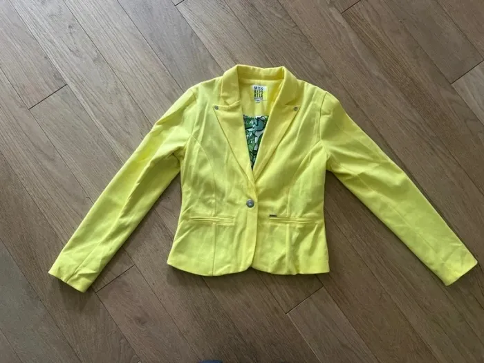 Vends veste jaune 158cm miss reporter très bon état