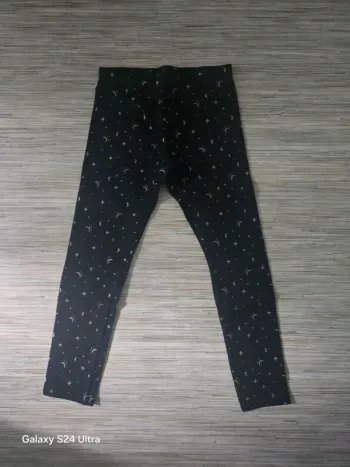 Legging épais noir motifs doré - Kiabi - Taille 10 ans