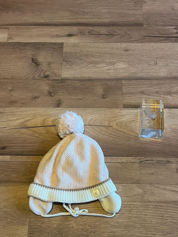 Je vend un bonnet bébé fille 45 cm très bon état