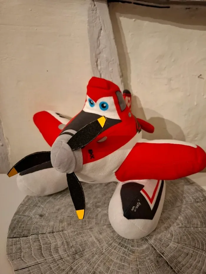 Peluche Planes Dusty bombardier a eau - 35 cm - photo numéro 1