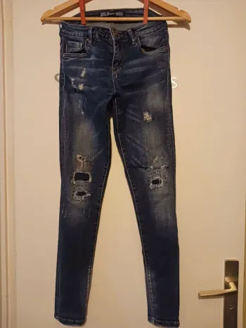 Jean troué slim femme