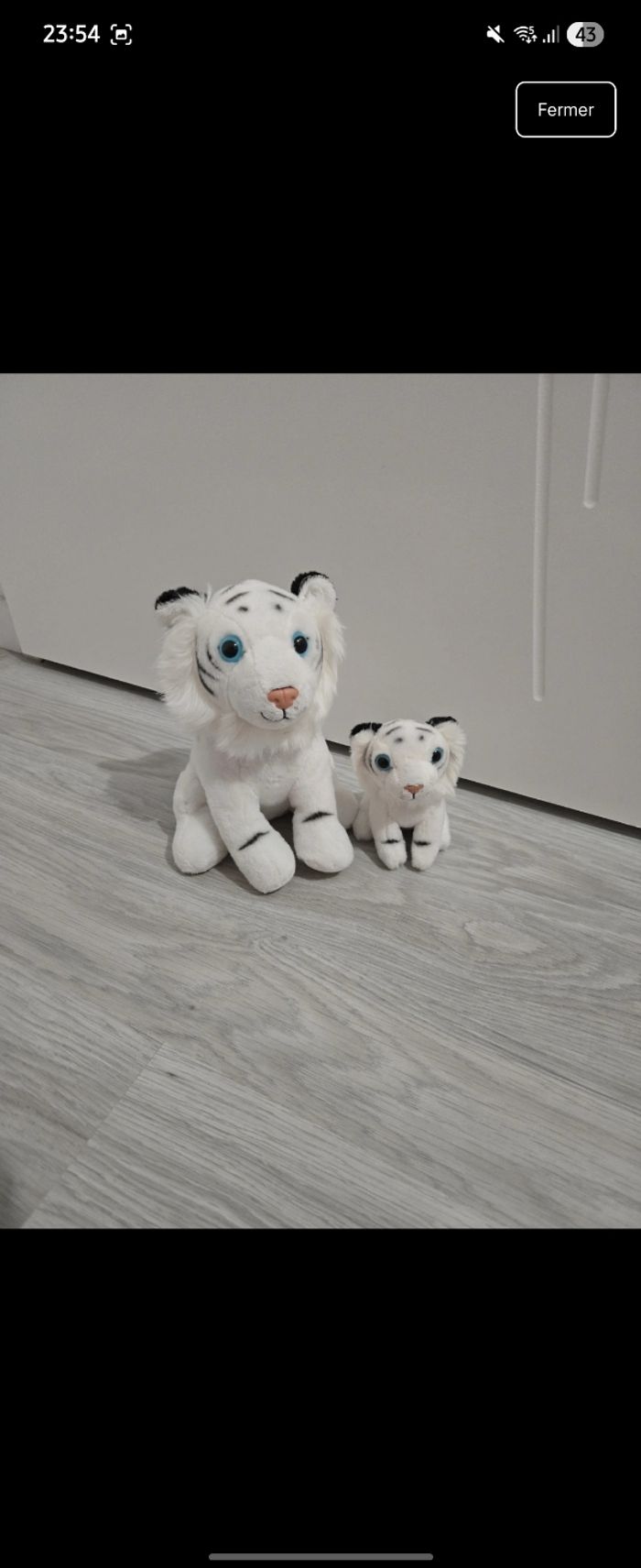 Peluche tigre blanc