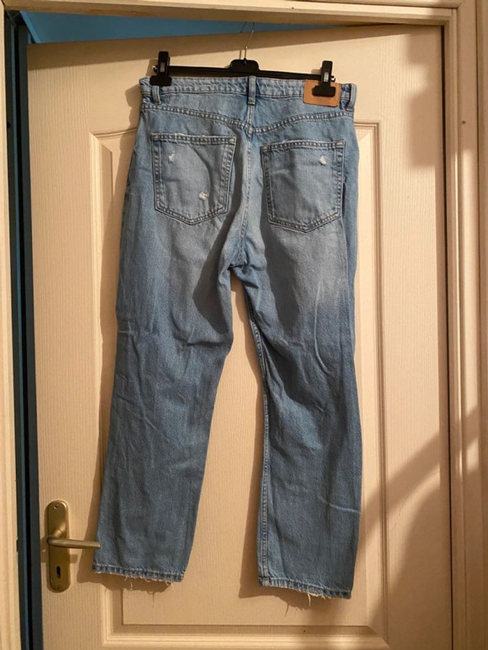 Jeans troué - photo numéro 7