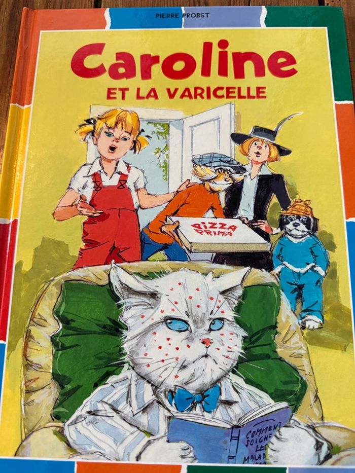 Très bon État - Livre Caroline et la Varicelle édition damiers bd album multicolore