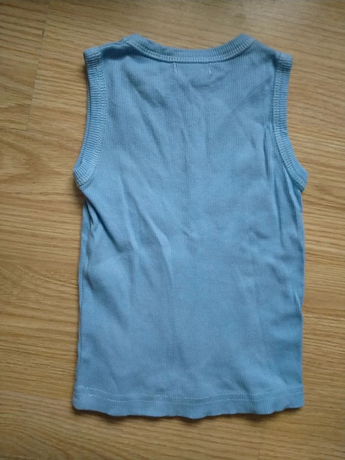 Débardeur bleu. U essentiel.
Taille 3 ans - photo numéro 4
