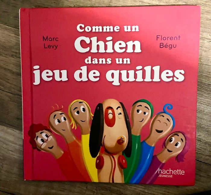 Livre Comme un chien dans un jeu de quilles