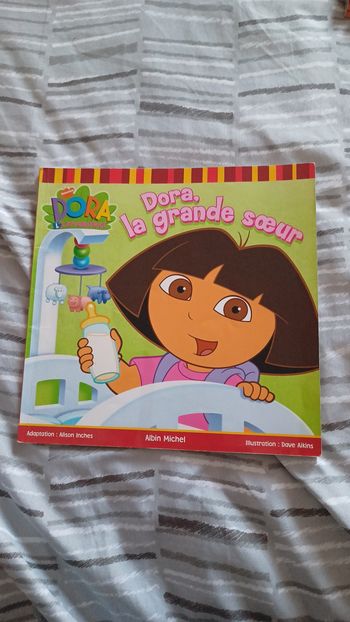 Livre dora la grande sœur