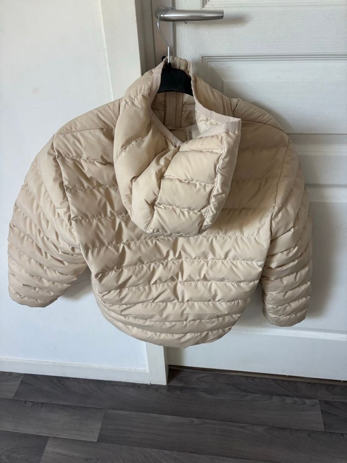 Doudoune Nike taille M  (12ans)