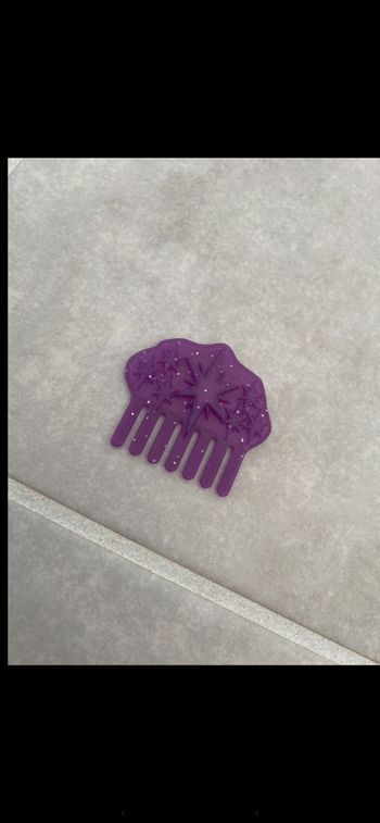 Jouet petit peigne poupée