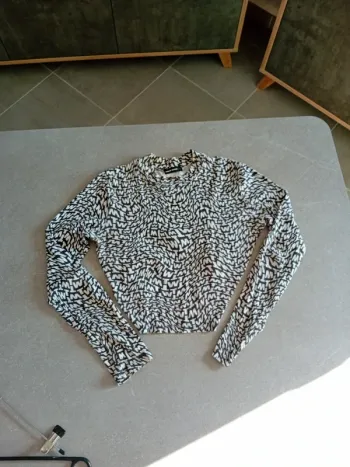 Top manche longue ouvert dans le dos en taille L de Tally Weiljl