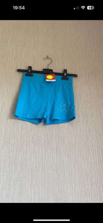 Short bleu 8 ans neuf