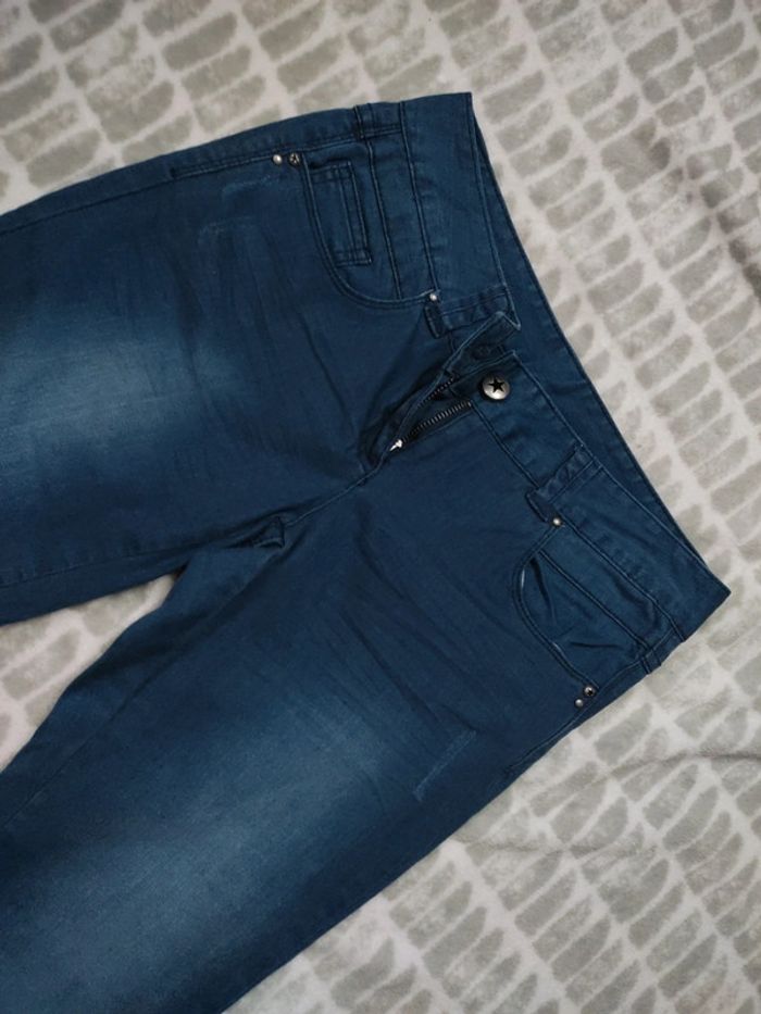 Pantalon jeans pattes d'éléphant évasé bleu effet délavé Camaïeu taille 38 - photo numéro 3