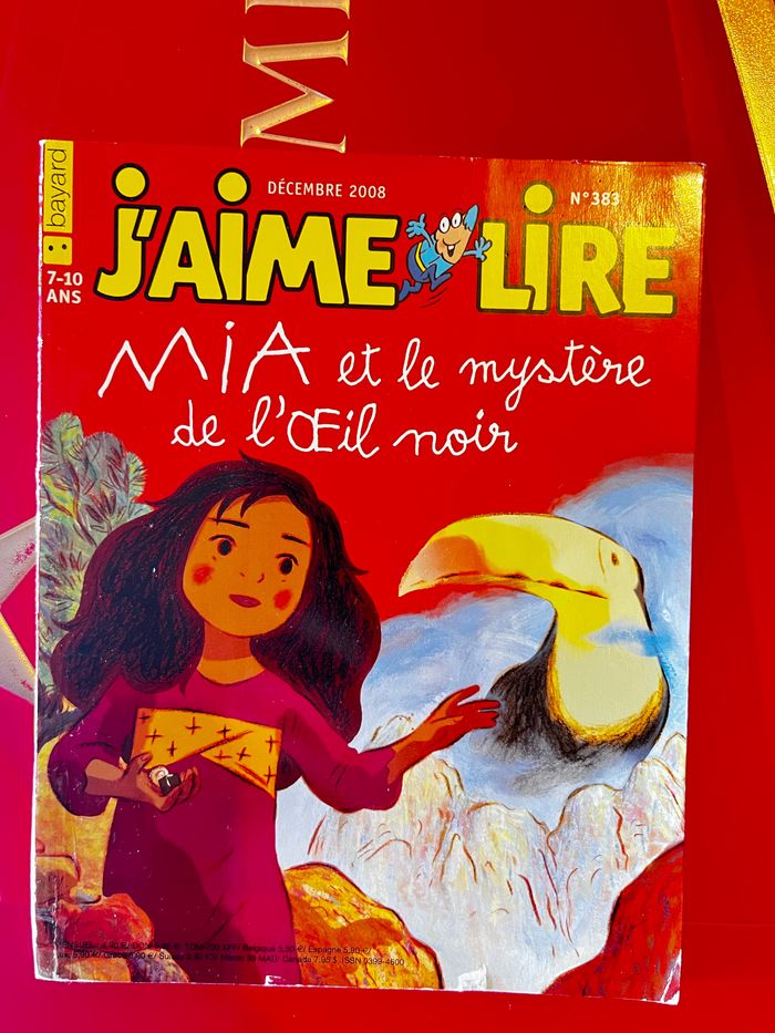 Livre , j’aime lire : mia et le mystère de l’œil noir, année 2008