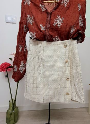 Minijupe tweed blanche bouton argenté