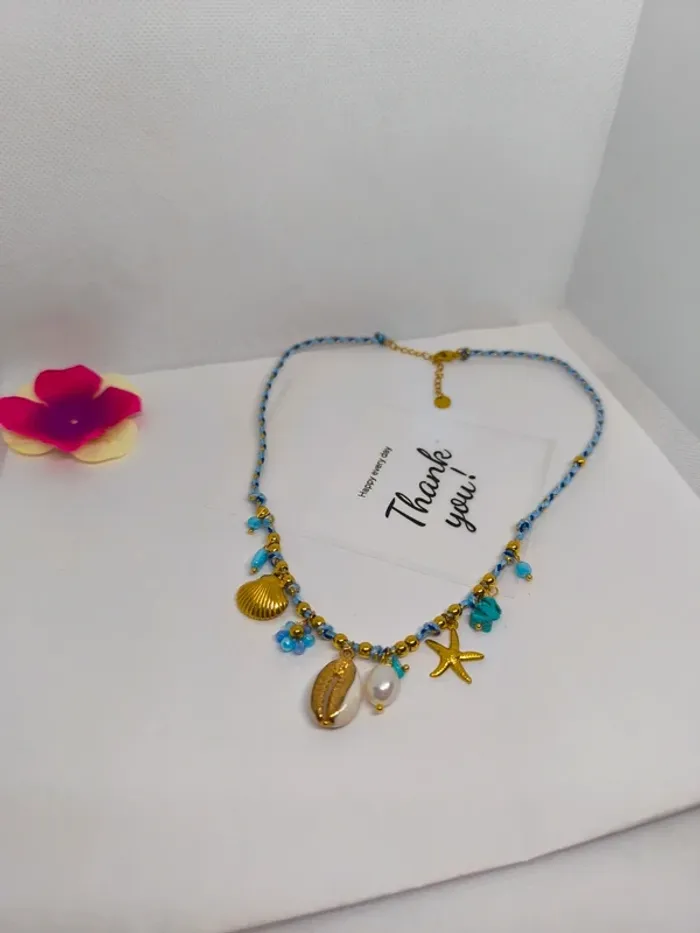 Collier doré et turquoise avec charms marins et fleur - photo numéro 8