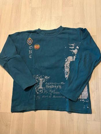 T-shirt orchestra 12 ans vert canard manches longues très bon état