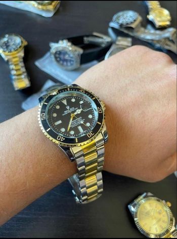 Rlx submariner noir doré