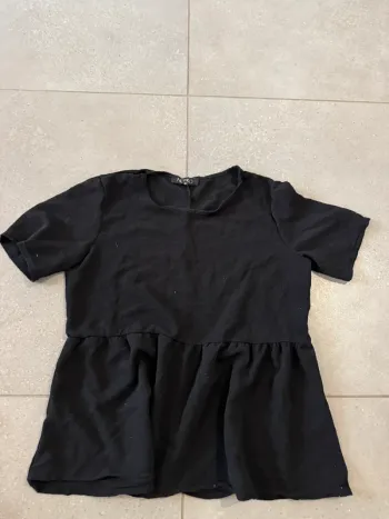 Haut noir Newco, taille M, très bon état