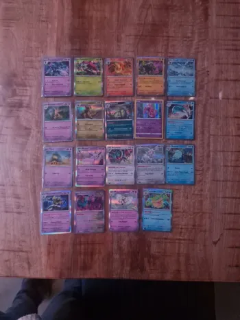 20 cartes Pokémon sous sleeves, superbe état