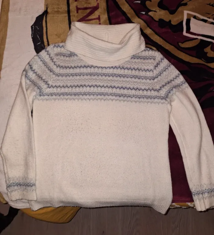 Pull col roulé