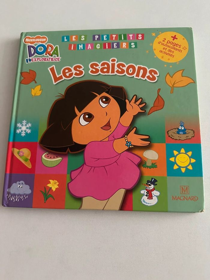 Livre Les saisons de Dora - en très bon état - photo numéro 1